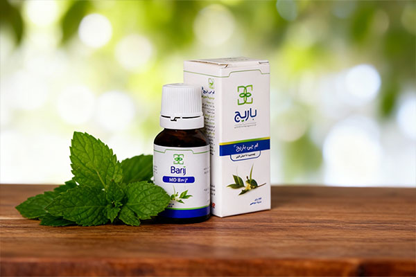 لوسیون ام جی باریج اسانس کنار برگ&zwnj;های سبز