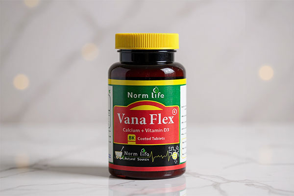 قرص وانا فلکس نورم لایف روی سطح مرمری سفید