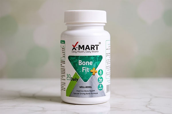 قرص بن فیت پلاس ایکس مارت روی سطح مرمر سفید