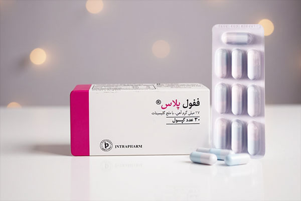 کپسولهای ففول پلاس کنار جعبه