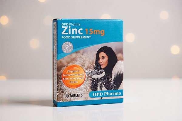 قرص زینک 15 میلی گرم او پی دی فارما روی سطح سفید