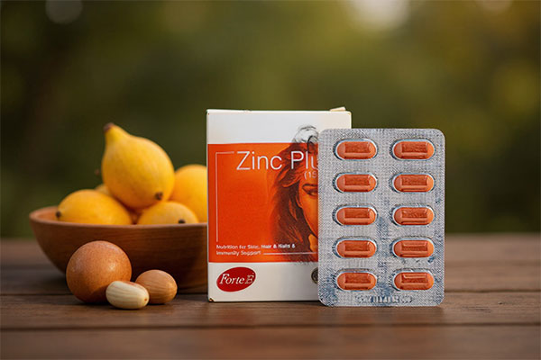 قرص زینک پلاس فورت ای 15 میلی گرم همراه با مواد غذایی سالم