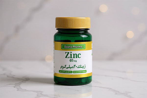 کپسول زینک ۴۰ میلی گرم دانا روی سطح مرمری سفید