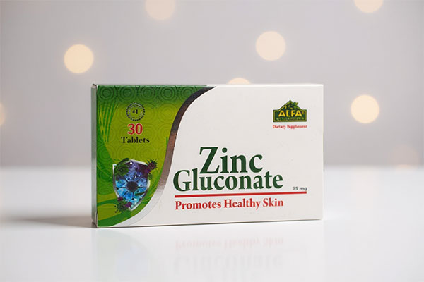 تصویر قرص زینک گلوکونات 35 آلفا ویتامینز روی سطح سفید