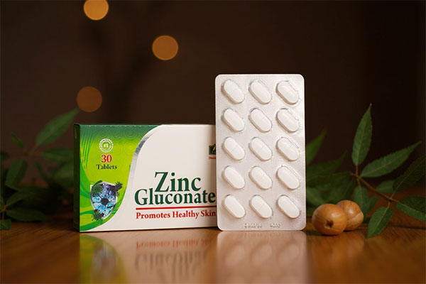 قرص زینک گلوکونات 35 آلفا ویتامینز کنار مواد طبیعی