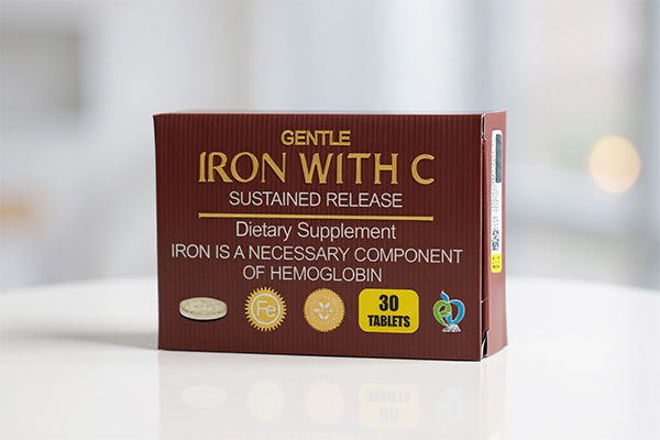 تصویر قرص آهن و ویتامین سی برونسون روی سطح سفید