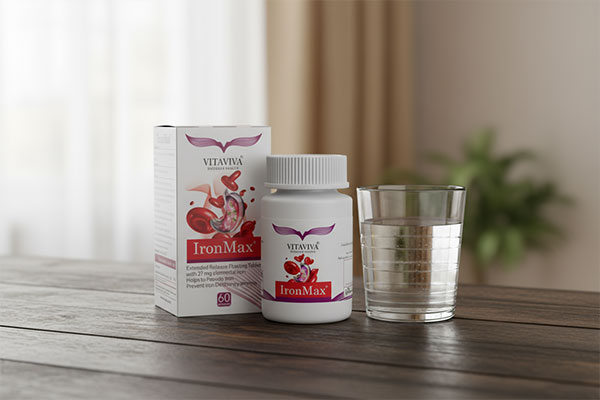 قرص آیرون مکس ویتاویوا کنار لیوان آب