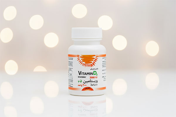 قرص ویتامین D3 بن فرول 2000 درسا دارو روی سطح سفید