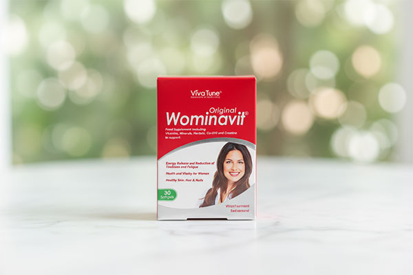 کپسول ومیناویت اوریجینال ویواتیون روی سطح مرمر سفید