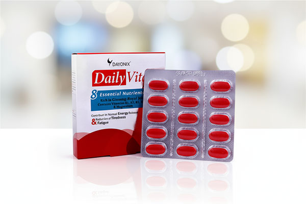 قرص دیلی ویتال دایونیکس فارما روی سطح سفید