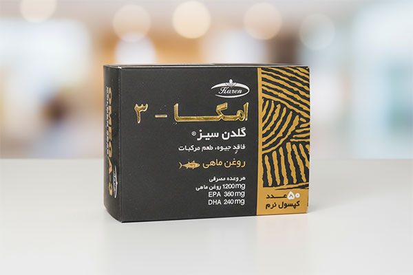 کپسول امگا 3 گلدن سیز کارن 50 عددی روی سطح سفید