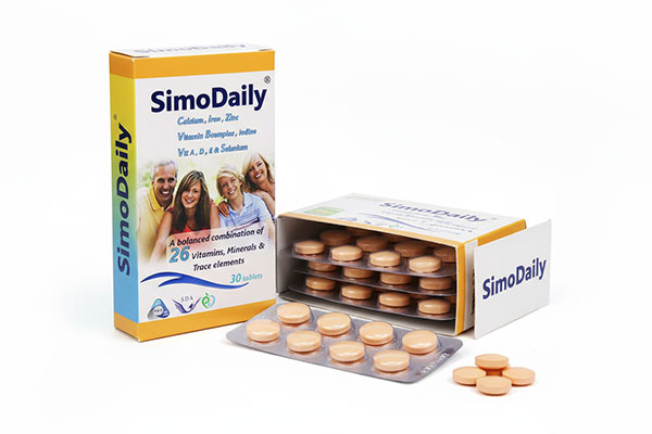 قرص سیمودیلی سیمرغ دارو عطار 30 عددی روی سطح مرمر سفید