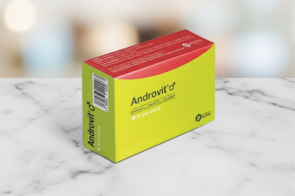 قرص آندروویت آقایان دارو درمان پارمیدا روی سطح مرمر سفید