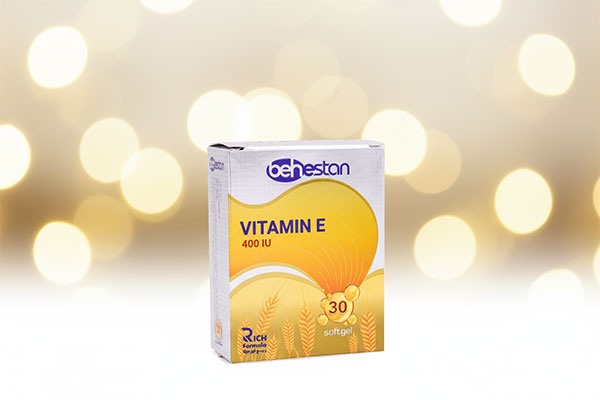 کپسول ویتامین ای 400 بهستان روی سطح سفید