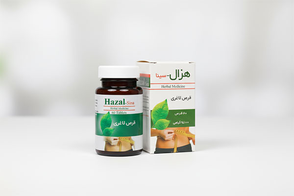 قرص لاغری هزال سینا فرآور روی سطح سفید