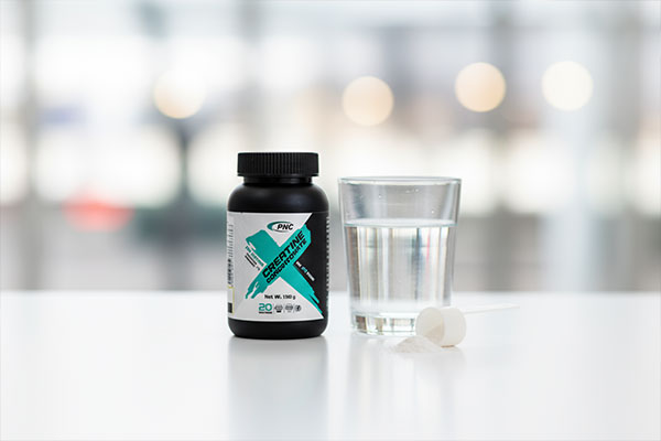 پودر کراتین مونوهیدرات پی ان سی 100 گرمی کارن با پیمانه و آب