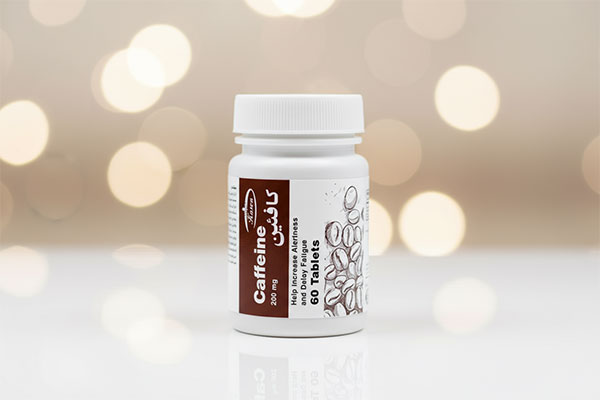 قرص کافئین کارن در بسته‌بندی قوطی پلاستیکی