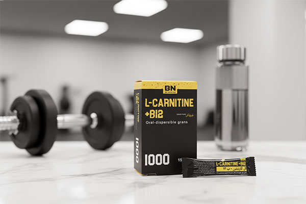 ساشه ال کارنیتین و ب12 بی اس کی کنار لیوان آب و لیمو