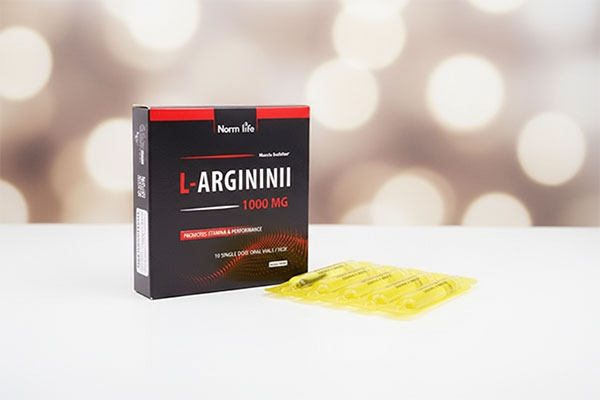 ویال ال آرژنین 1000 نورم لایف روی سطح سفید