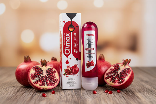 ژل لوبریکانت تنگ کننده انار کلایمکس کنار میوه‌های انار