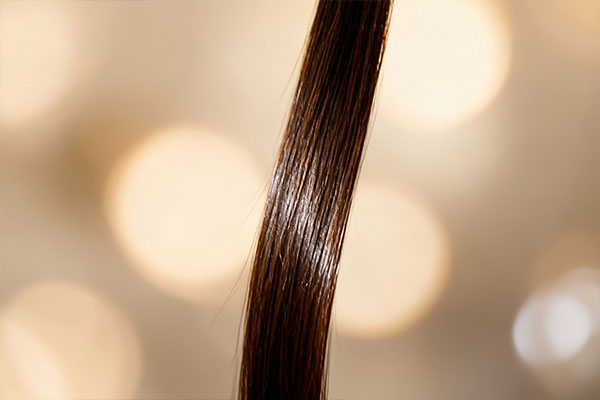 استفاده از شامپو تقویت کننده ماینوکسیدیل لامینین برای تقویت مو