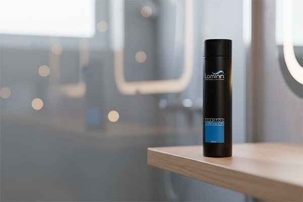 شامپو موهای چرب لامینین روی قفسه حمام