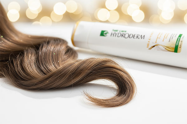 شامپو ترمیم کننده مو شیر و عسل هیدرودرم برای موهای درخشان