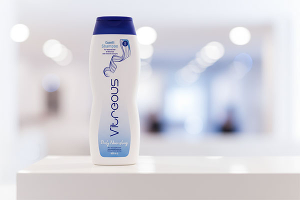 شامپو ویتامینه کاپلی ویتروس روی قفسه حمام