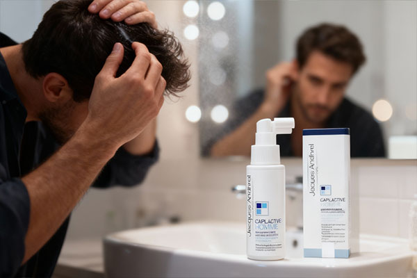 استفاده از تونیک ضد ریزش مو کپیل اکتیو ژاک آندرل روی پوست سر