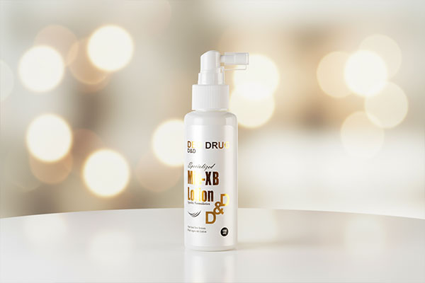 تصویر لوسیون تقویت کننده مو Min XB دئودراگ با بسته‌بندی