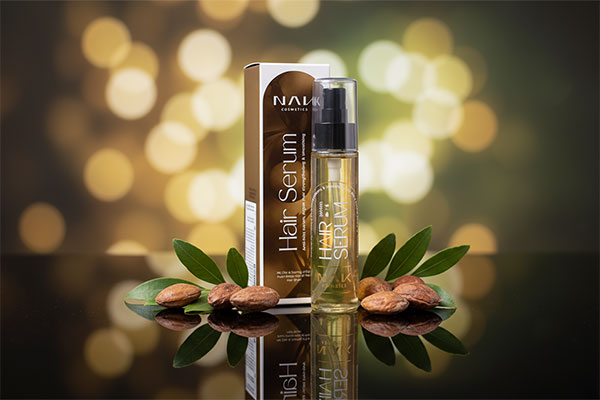 سرم ضد وز و تقویت کننده مو آرگان ناک روی سطح بازتابنده