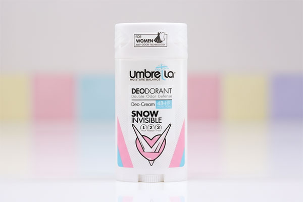 دئودورانت خوشبو کننده بدن زنانه اسنو آمبرلا روی میز سفید