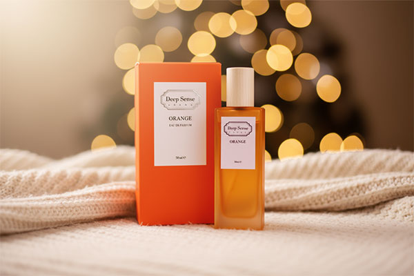 ادو پرفیوم زنانه اورنج دیپ سنس روی سطح نرم