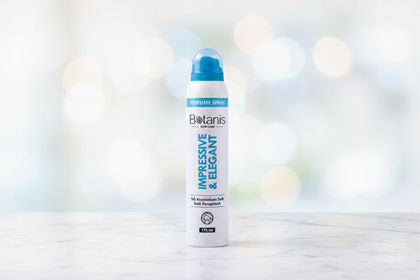 اسپری بدن زنانه الگانت بوتانیس روی سطح مرمر سفید