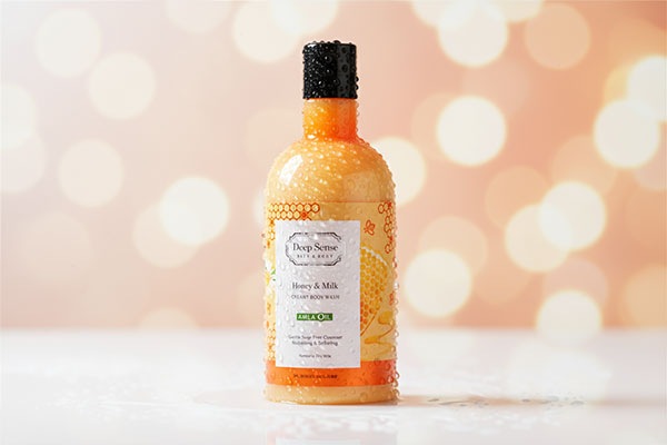 شامپو بدن کرمی شیر عسل دیپ سنس با قطرات آب