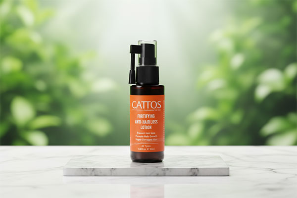 تونیک ضد ریزش مو کاتوس روی سطح سفید