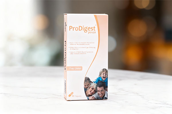 کپسول پرودایجست گسترش میلاد فارمد روی سطح مرمر سفید