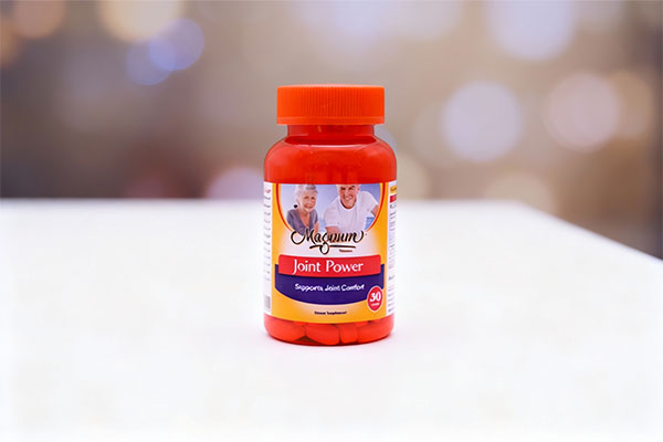 تصویر قرص جوینت پاور مگنوم ویتامینز روی سطح سفید