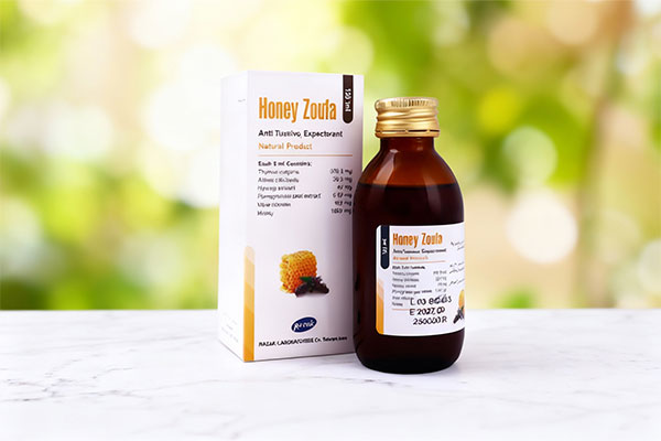 تصویر شربت زوفا عسلی رازک روی سطح مرمر سفید