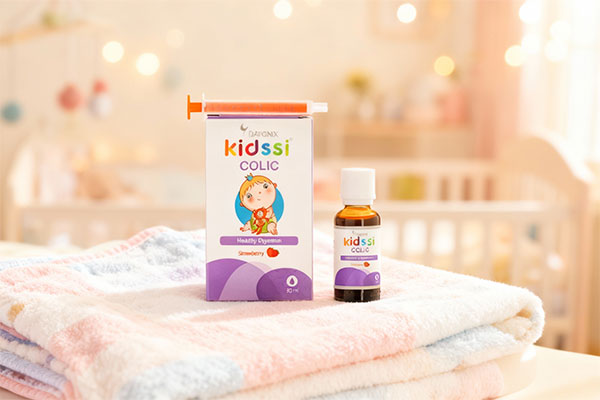 قطره کیدزی کولیک دایونیکس فارما روی پتوی نوزاد