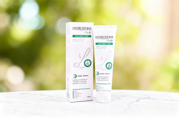 کرم رفع خستگی پا هیدرودرم روی سطح مرمر سفید